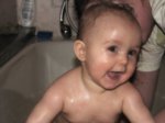 8 months old, in the bath.